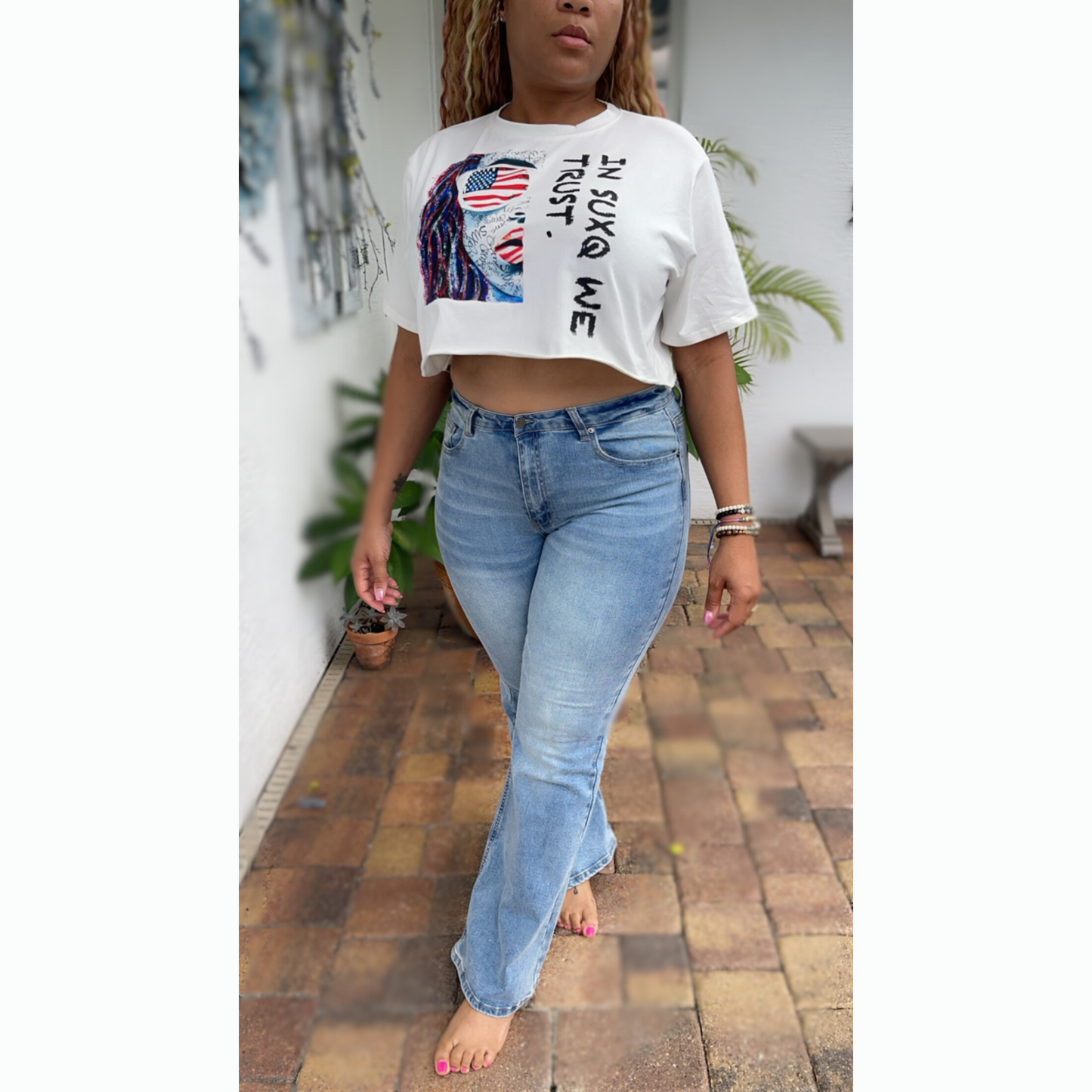 Women Short Sleeve Graphic Tee Cropped Top In SUXQ We Trust