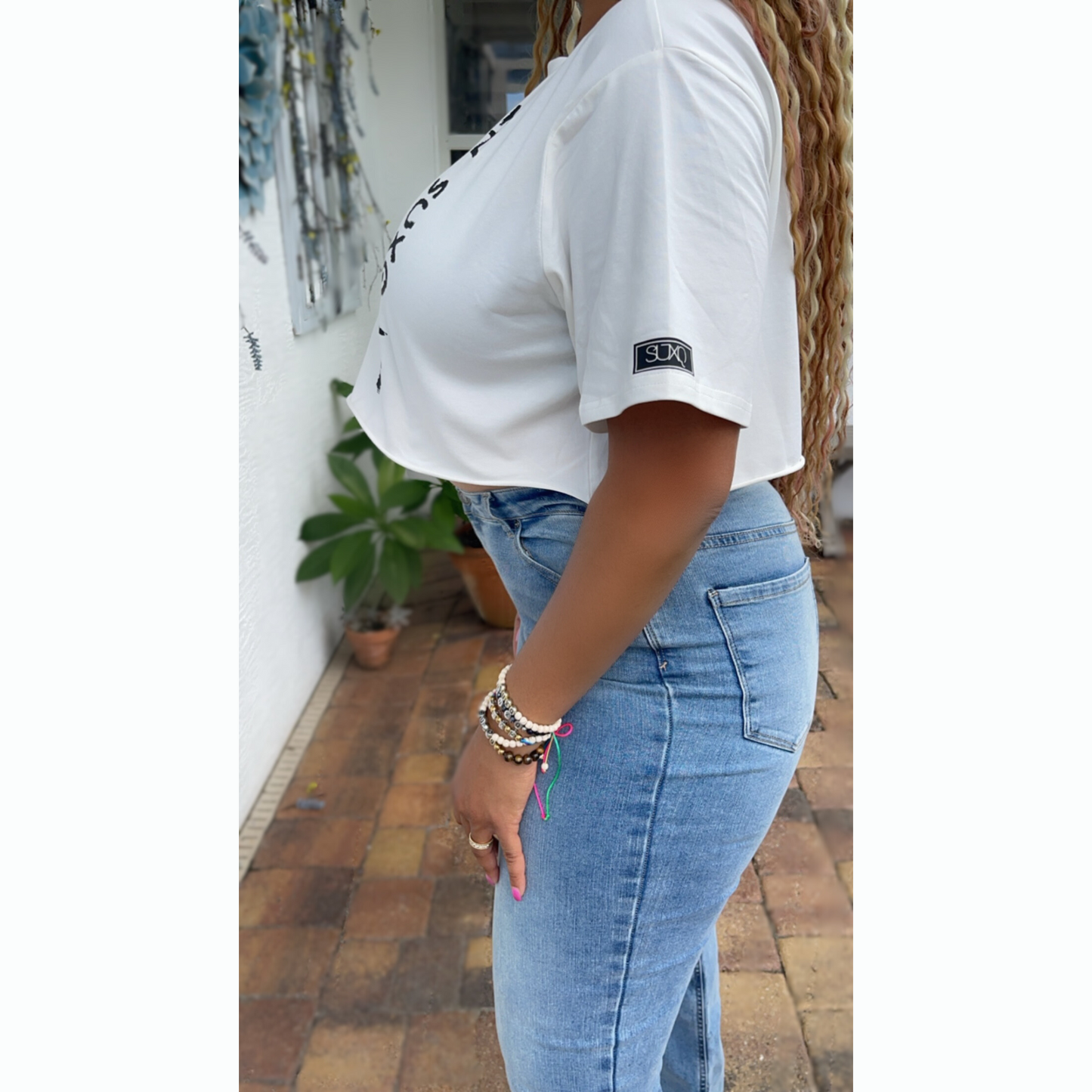 Women Short Sleeve Graphic Tee Cropped Top In SUXQ We Trust